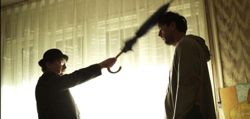 There's a Man in the Habit of Hitting Me on the Head with an Umbrella: Short story by Fernando Sorrentino